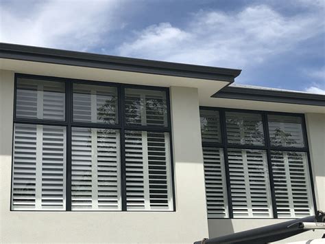 Black Windows White Plantation Shutters