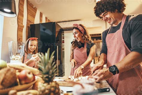 Teamwork In The Kitchen 13887402 Stock Photo at Vecteezy