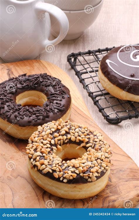 Donuts Chocolate And Peanut Stock Photo Image Of Dairy Icing 245342434