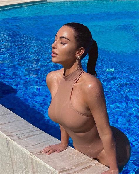 Kim Kardashian Posts Sexy Swimsuit Snap Showing Off Curves In Nude One Piece Amid Relaxed