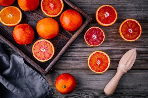 Premium Photo Sliced And Whole Ripe Juicy Sicilian Blood Oranges And