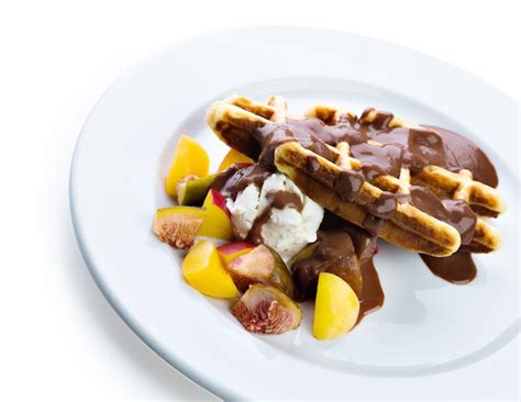 Premium Photo Belgium Waffles With Fresh Berries And Chocolate Sauce