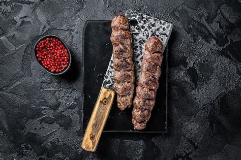 Premium Photo Urfa Kebab Ground Beef And Lamb Meat Grilled On Skewers