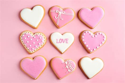 Premium Photo Decorated Heart Shaped Cookies On Color Background Flat