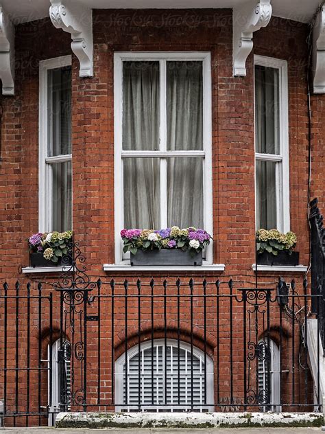 "Red Brick Facade Of A Residential Building In London/England" by ...