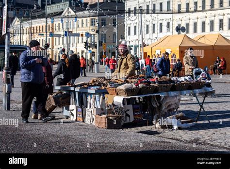 Market vendor or stall keeper selling tourist souvenirs at Market ...