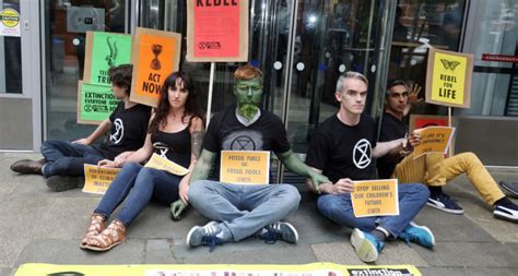 Extinction Rebellion Climate Protesters Glue Themselves To Government