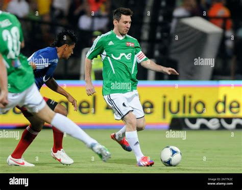 Argentina S Lionel Messi Right Dribbles Past Colombia S Jhony Ramirez