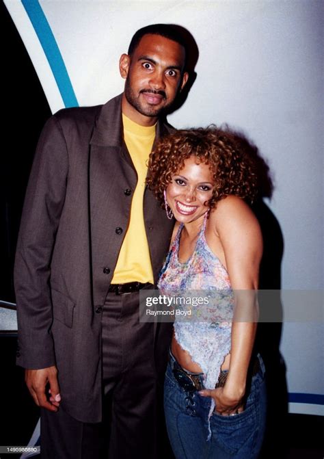 Singer Tamia poses for photos with her husband, Detroit Pistons... News ...