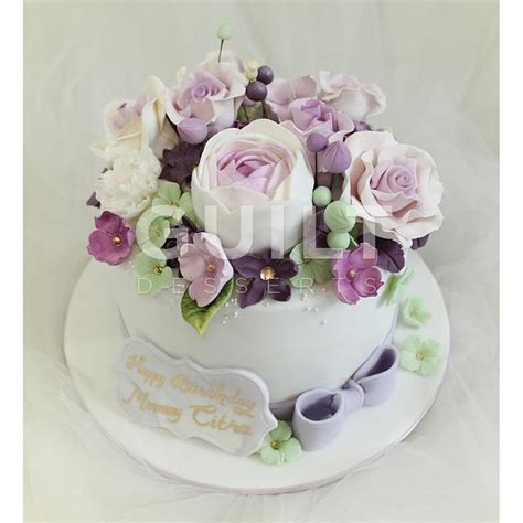 Purple Bouquet Decorated Cake By Guilt Desserts Cakesdecor