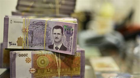 The Syrian Pound Continues Collapse; One Dollar for 13,000 Liras - The ...