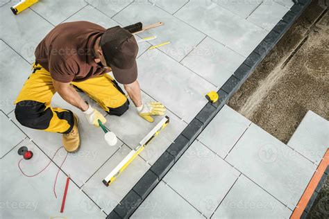 Installing Paving Bricks Patio Floor 24525252 Stock Photo at Vecteezy