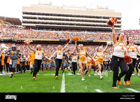 October 10, 2015: Tennessee Volunteers cheerleaders running through the ...