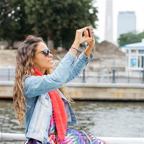 Woman Taking Pictures By Stocksy Contributor Mosuno Stocksy