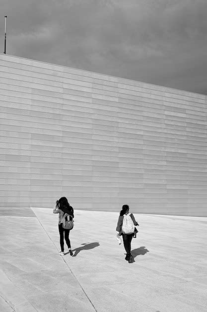 Premium Photo Full Length Of Men On Road Against Sky