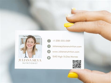 A Professional Business Card With Your Photo And Qr Code Printed On It