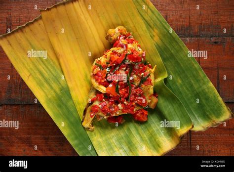 Ayam Balado, Padang Chicken with Crushed Red Chili Peppers Stock Photo - Alamy