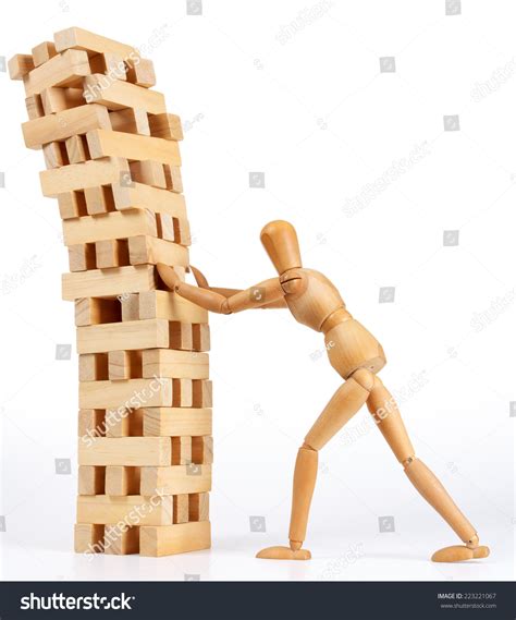 Jenga Tower Falling Down Photos And Images