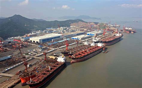 cosco singapores net income plunges  lloyds list