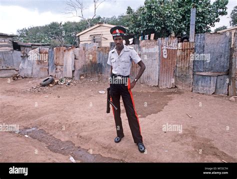 Armed Kingston Police In Jamaican Shanty Town Kingston Jamaica Stock