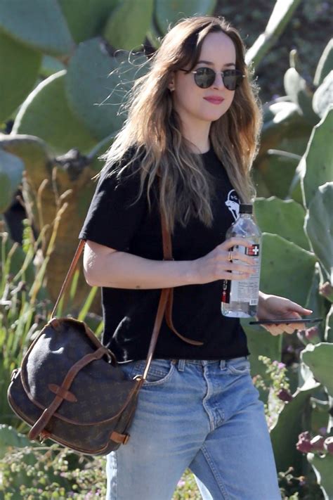 Dakota Johnson Debuts Blonde Highlights | Teen Vogue