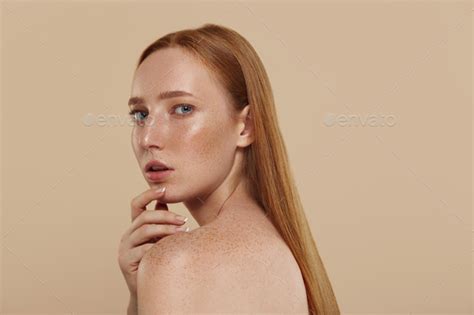 Redhead Pretty Caucasian Girl With Naked Shoulders Stock Photo By Vadymvdrobot