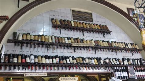 Display of Old Wine Bottles in Wall Arch Editorial Stock Image - Image ...