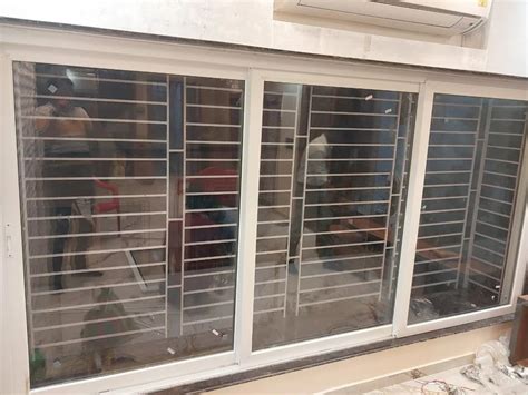 Toughened Glass White Upvc Track Sliding Window At Rs Sq Ft In