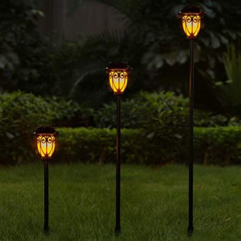 Camabel 56 Tall Solar Torch Lights 4 Pack With Flicking Flame 100 Me Beautiful Gardener