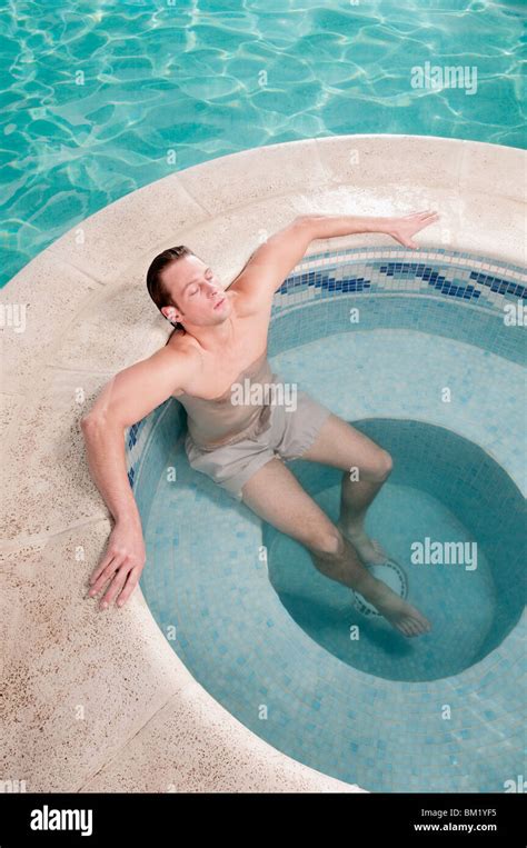 Man Relaxing In A Hot Tub Stock Photo Alamy