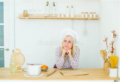 Dreaming Beautiful Blonde Girl Is In The Kitchen Stock Photo Image Of Woman Blonde 142137340