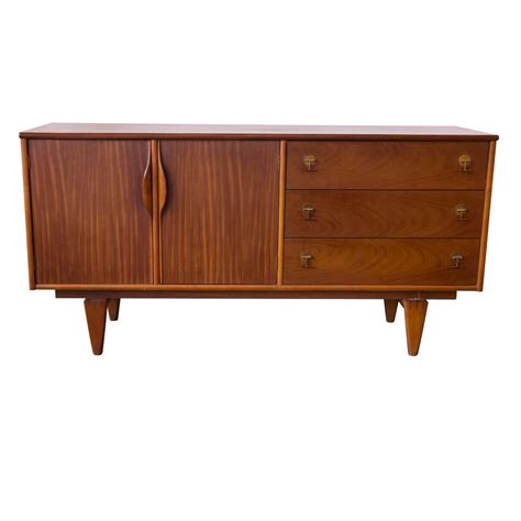 Mid Century Walnut Credenza By Bassett At 1stdibs