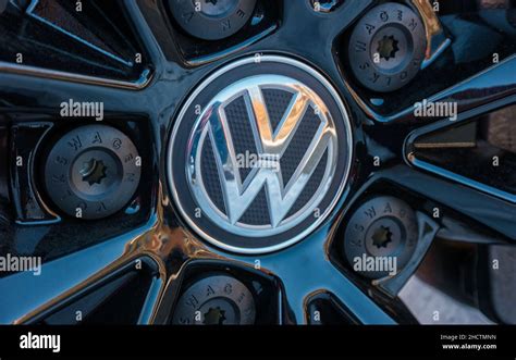 Sign of a Volkswagen logo on a car rim.. Volkswagen is a German ...