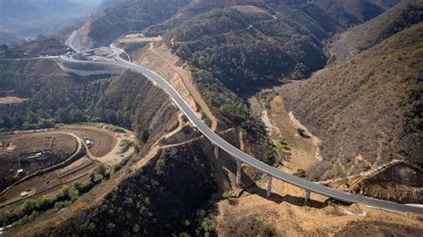 Cuántos kilómetros son de OAXACA a la Costa con la nueva autopista a