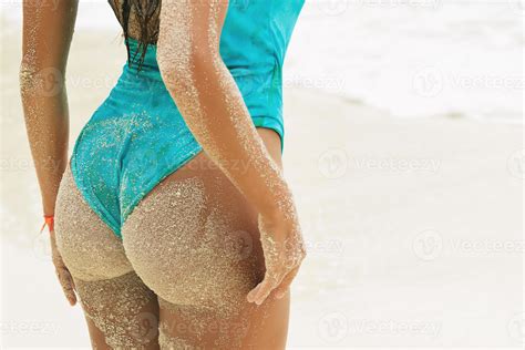 Sexy Female Buttocks Covered With Sand On Beach Stock Photo At