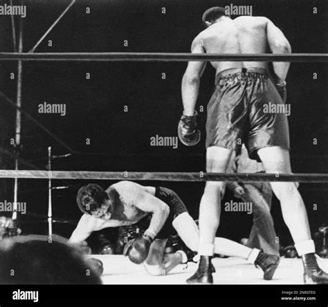 World Heavyweight Champion Joe Louis Standing Beginning In The 13th