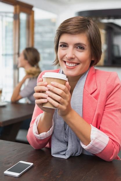 Premium Photo Pretty Brunette Enjoying Her Coffee