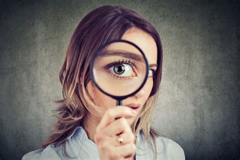 Girl With Large Eye Looking Through Magnifying Glass Back On Track Teens