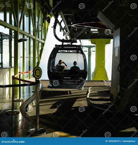 Cable Car about To Go for Its Ride in the Station, Two People