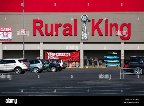 A logo sign outside of a Rural King Supply retail store location in ...