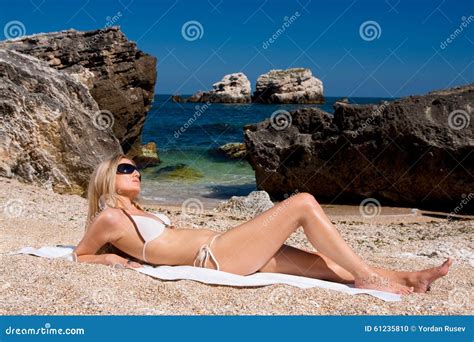 Attractive And Blonde Girl On The Beach Stock Photo Image Of Resort Summer 61235810