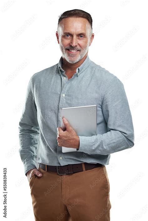 PNG Studio Portrait Of A Mature Man Holding A Digital Tablet Against A Grey Background Stock