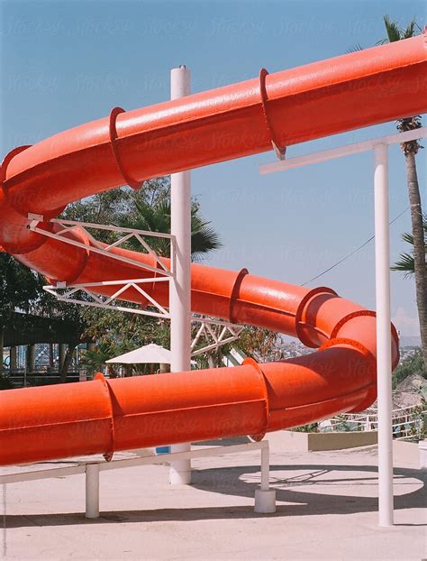 "Red Waterslide" by Stocksy Contributor "Douglas Robichaud" - Stocksy