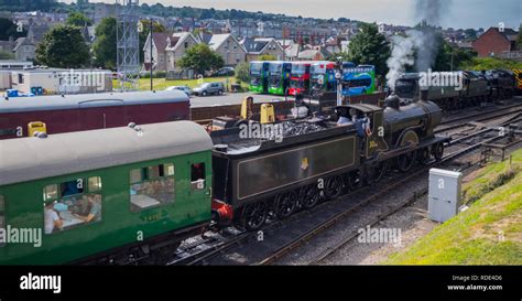 Steam Locomotive Leaving The Train Station Swanage Dorset UK Stock