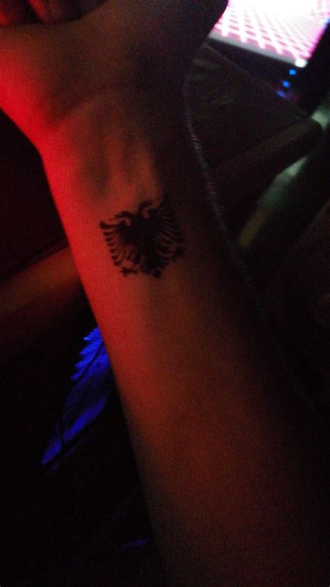 I got a temporary tattoo with the flag of the country : r/albania