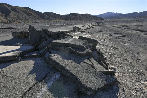 Flash flood damage on desert road – Geology Pics