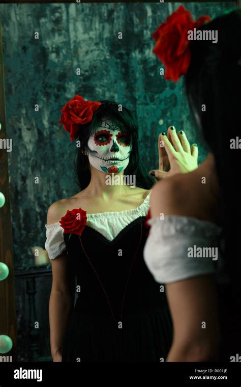 Halloween image of woman with zombie makeup Stock Photo - Alamy