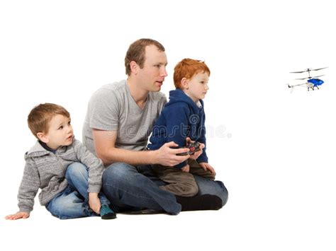 Dad and Sons Playing Kids Helicopter Game Stock Photo - Image of ...