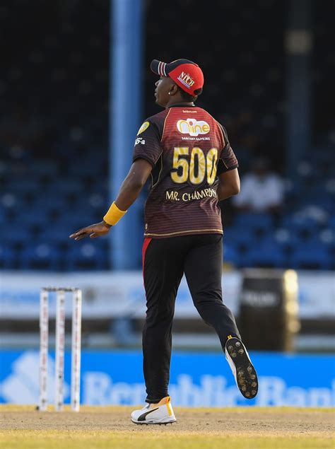 Dwayne Bravo wears a special 'Mr Champion 500' shirt | ESPNcricinfo.com