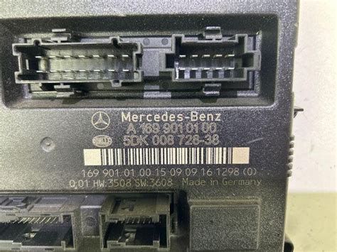 MERCEDES BENZ B W245 Komfortsteuergerät 1699010100 5DK00872838 25009222